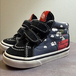Vans x Peanuts Sk8-Mid Reissue V Toddler "Flying Ace" shoes.